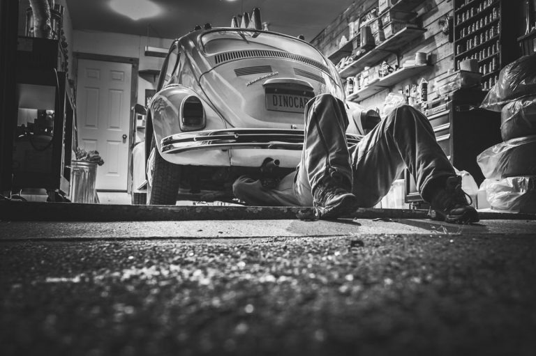 mechanic working on a car