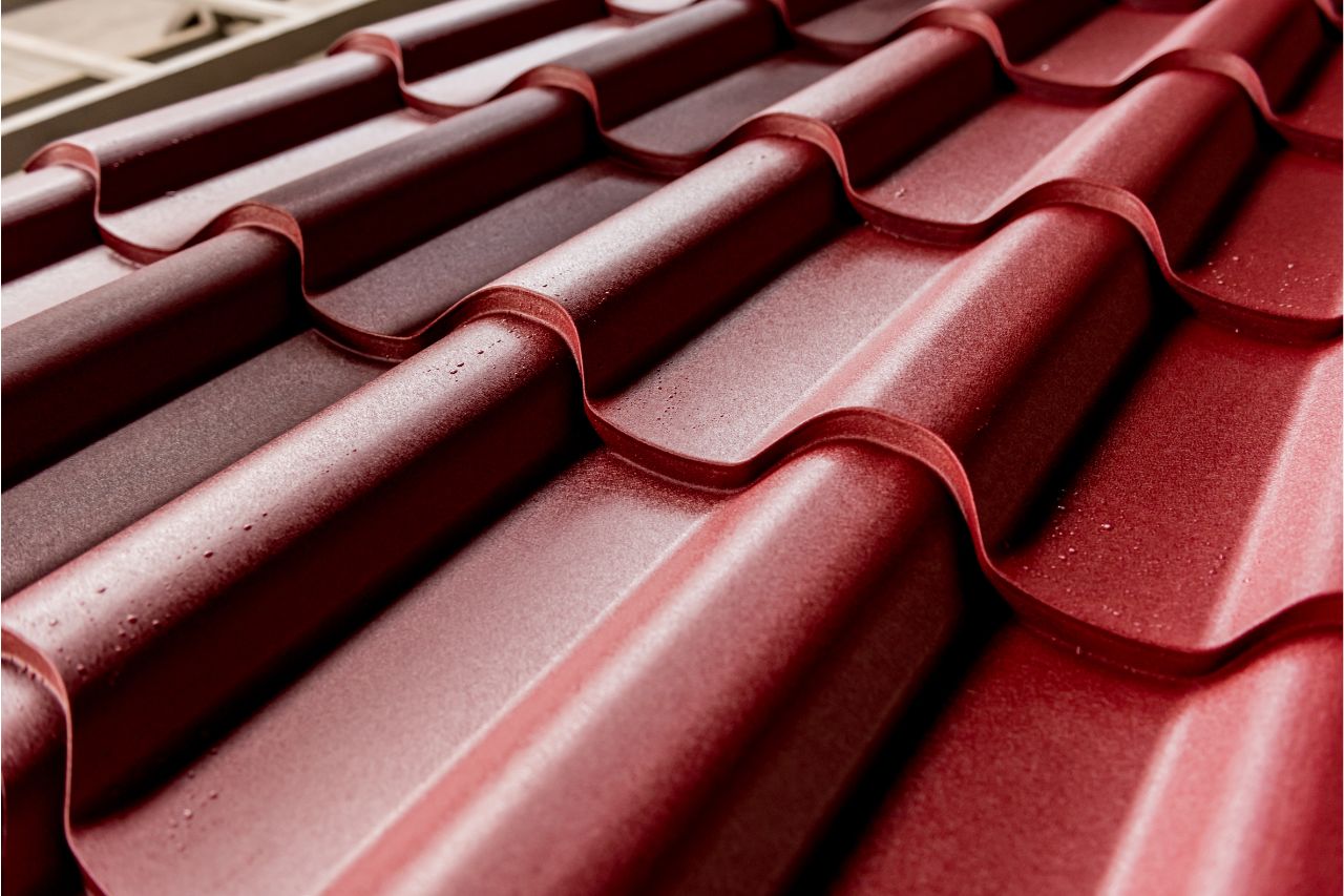 Close up of a red corrugated metal roof
