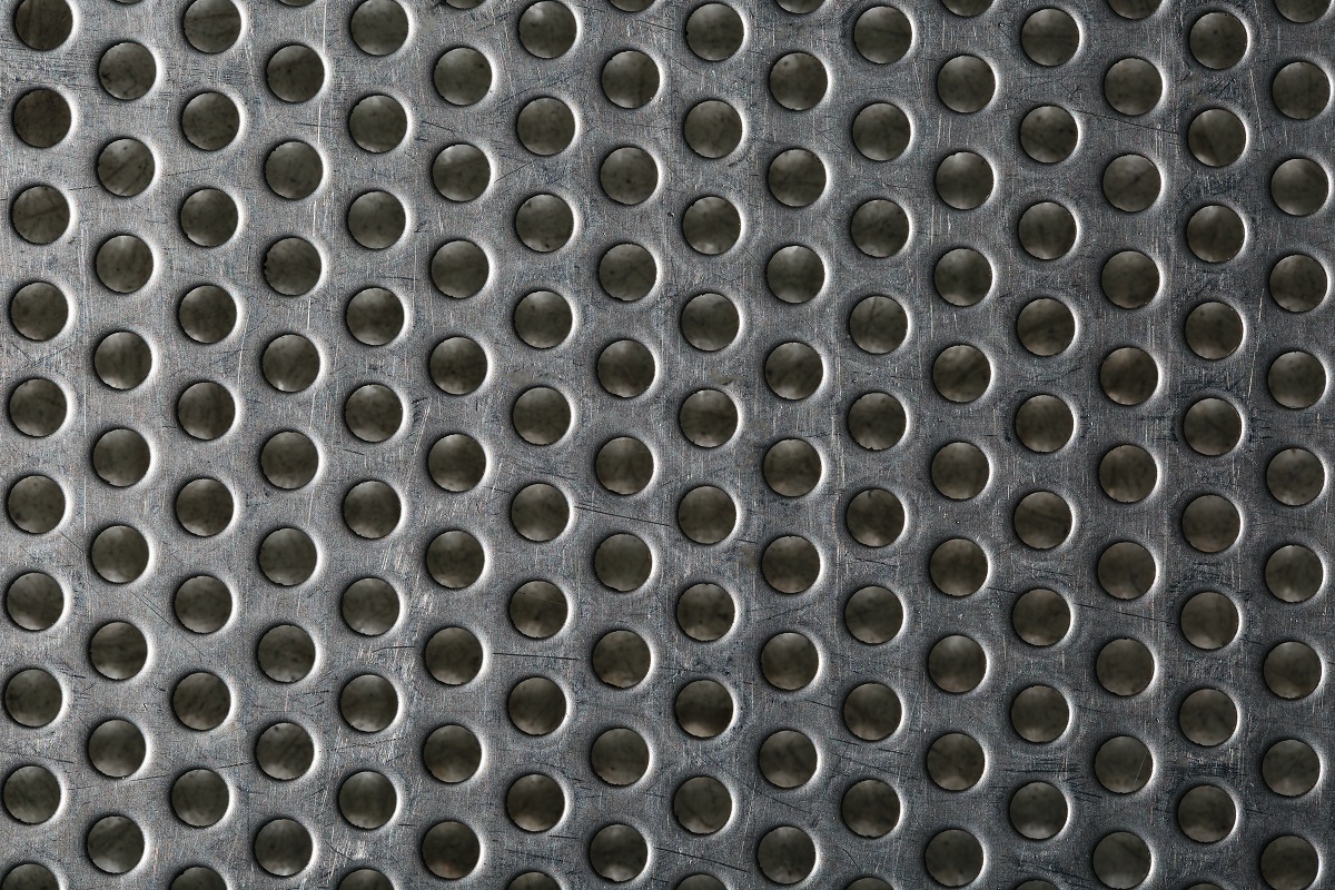 Silver metal shaped like a honeycomb for design background.