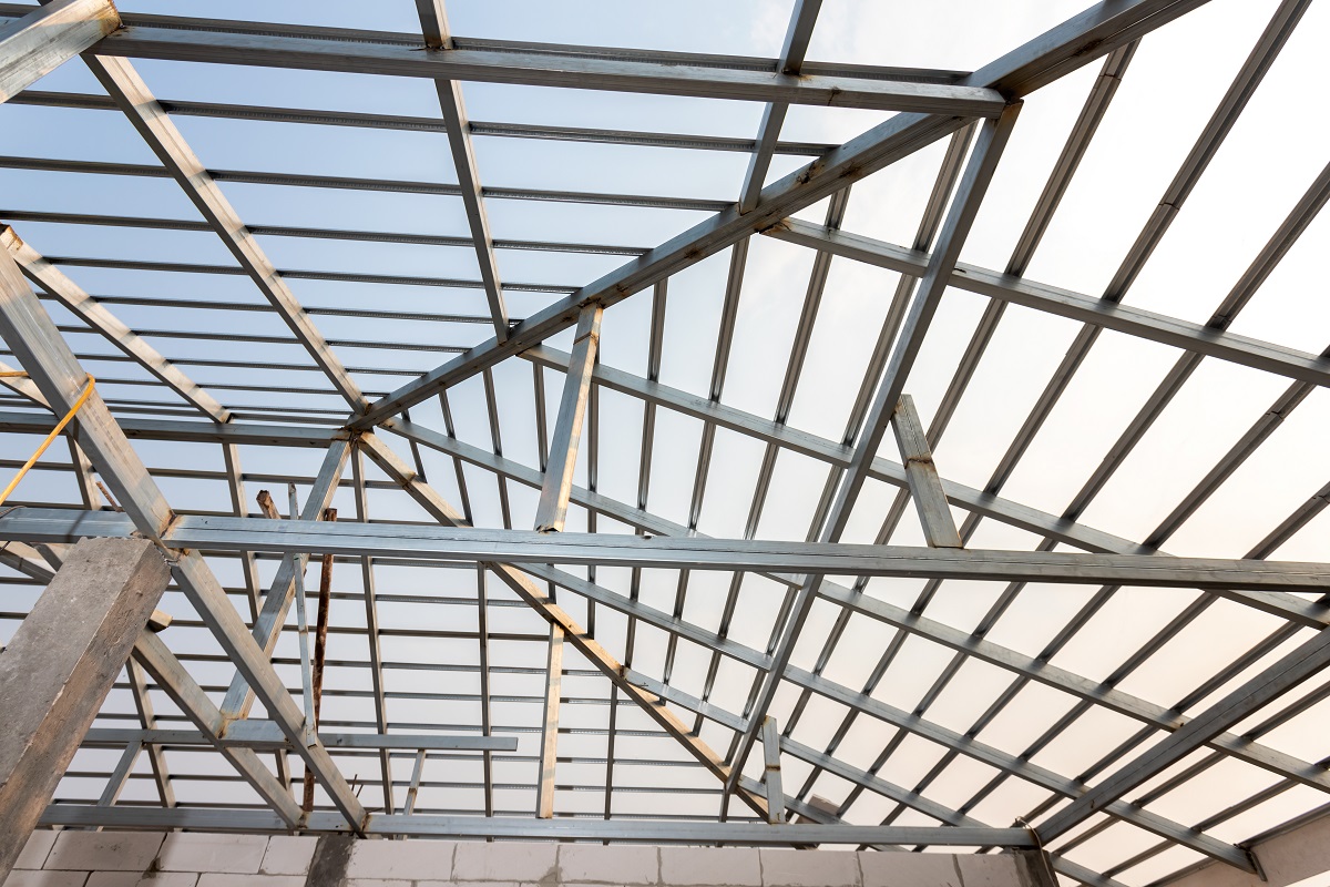 Structure of steel roof frame for home construction. Concept of