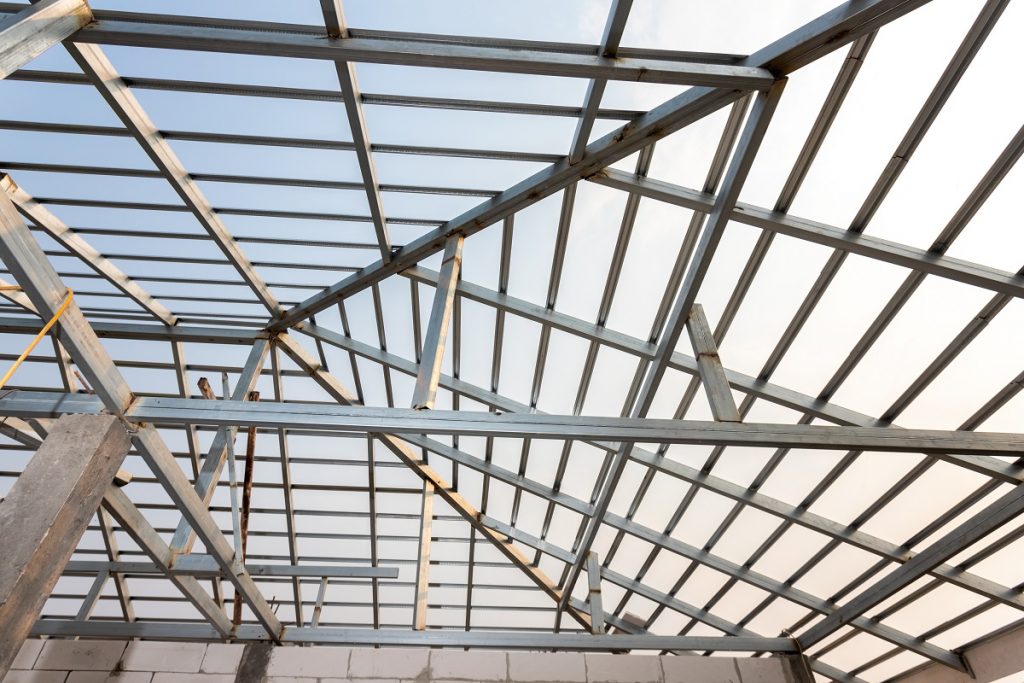 Structure of steel roof frame for home construction. Concept of