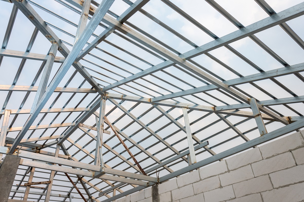 Structure of steel roof frame for home construction. Concept of