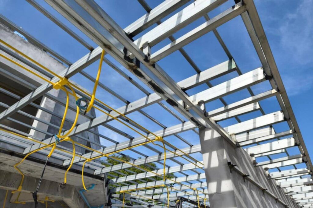 Steel purlins stacked at a local supplier showing price variations influenced by market factors